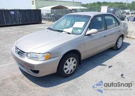 2002 Toyota Corolla Le z USA, uszkodzony, nr VIN 2T1BR12EX2C577933